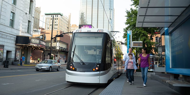 KC Streetcar with family boarding